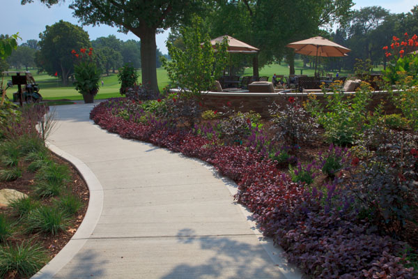 Concrete Walkway with Decorative Landscaping